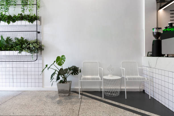 istock Coffee shop interior design With chairs and white walls. Empty on people. 1338184569