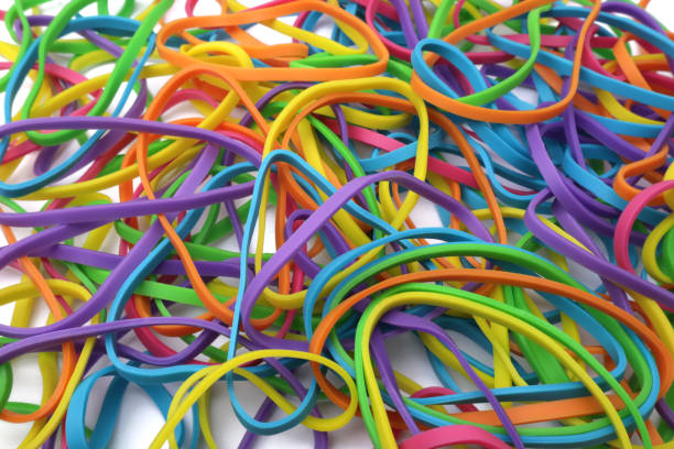 istock Colorful multi color elastic rubber bands texture isolated on white 1338190544
