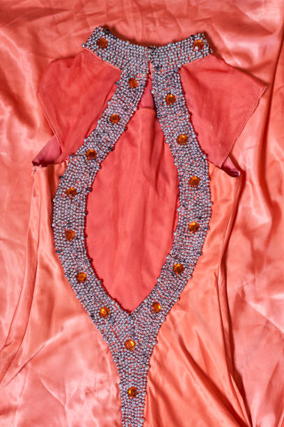 istock Close-up of orange evening gown 1338192928