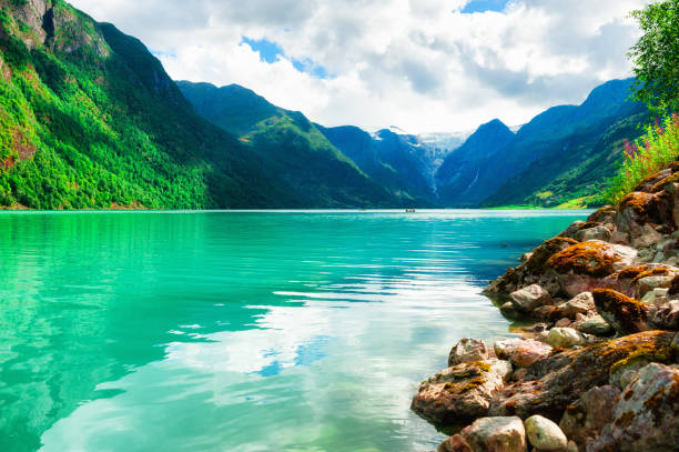 istock Beautiful lake and mountains with glacier in Norway. 1338198424