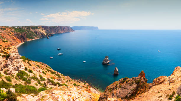 istock Beautiful sea coast with turquoise water and rocks. 1338198425