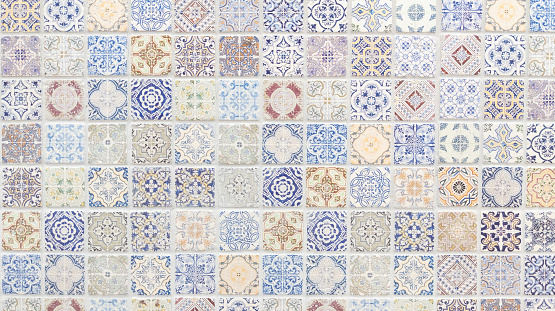 vintage floral background in azulejo patchwork ceramic tiles geometric wallpaper pattern