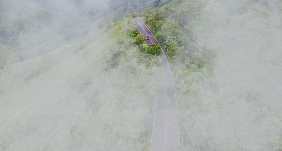 sky road over top of mountains with green jungle in Nan province, Thailand