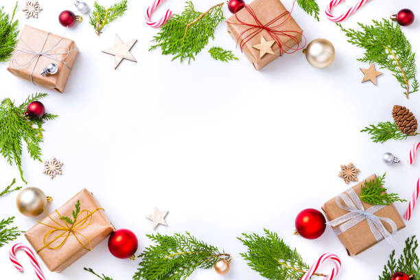 istock Frame made with christmas gifts on white background 1338213993