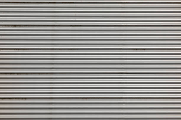 istock background of grey corrugated metal 1338214820