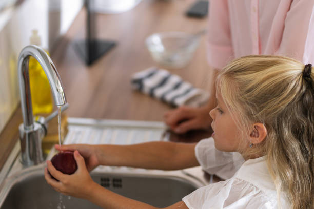 istock A mother and daughter in the kitchen 1338216366