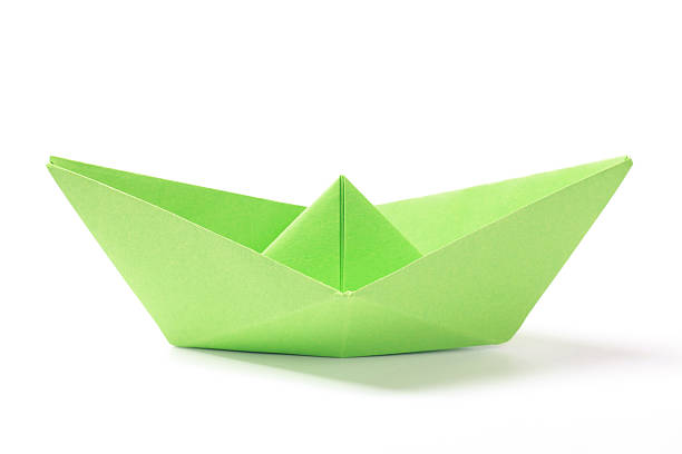 istock Green paper boat 133821822