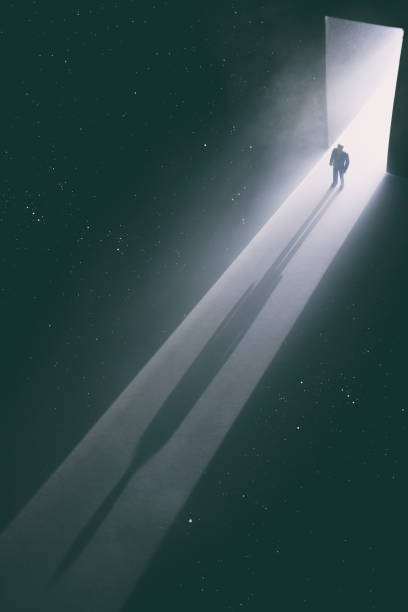 istock Walking Through The Doorway Into Darkness 1338220791