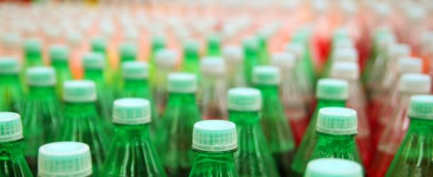 istock colorful juice beverage plastic bottle in factory 1338222930