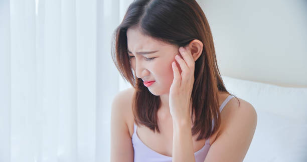 istock woman scratching her face 1338224265
