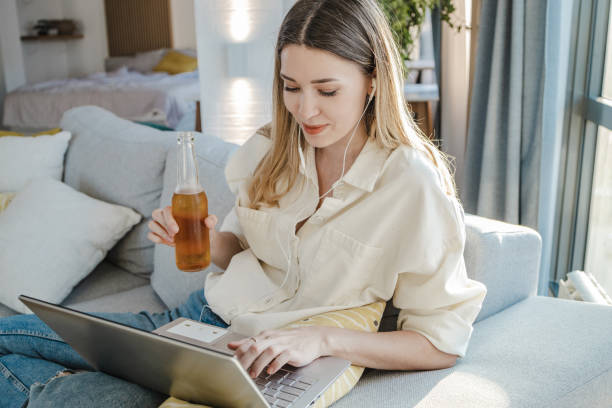 istock Drinking beer at home and relaxing after work 1338225329