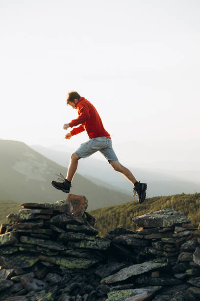 istock A young hipster activity in the mountains at the sunset 1338228360