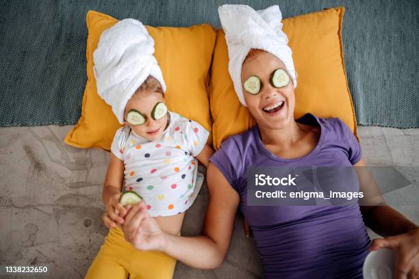 Mother And Daugther At Home Stock Photo - Download Image Now - Mother, Cucumber, Eye