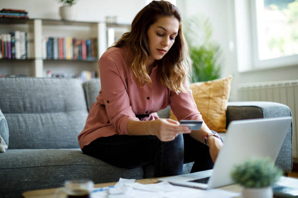 istock Young woman shopping online 1338240119