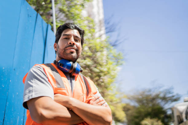 istock Portrait of a confident construction worker at a construction site 1338243604