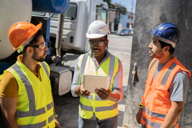 istock Coworkers doing a meeting in a construction site 1338243640
