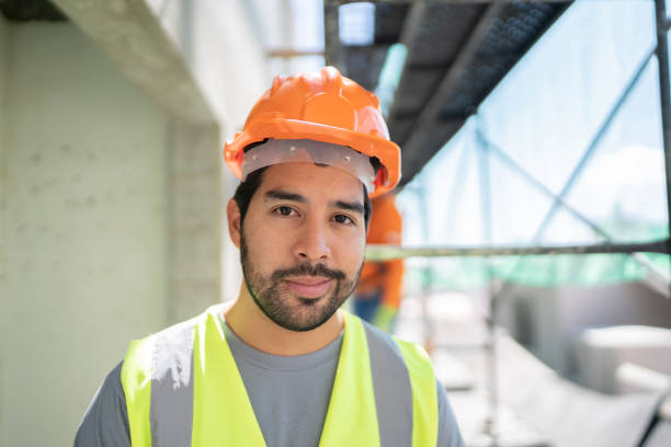 istock Portrait of a confident construction worker at a construction site 1338246063