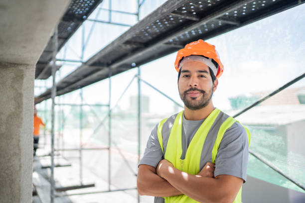 istock Portrait of a confident construction worker at a construction site 1338246135