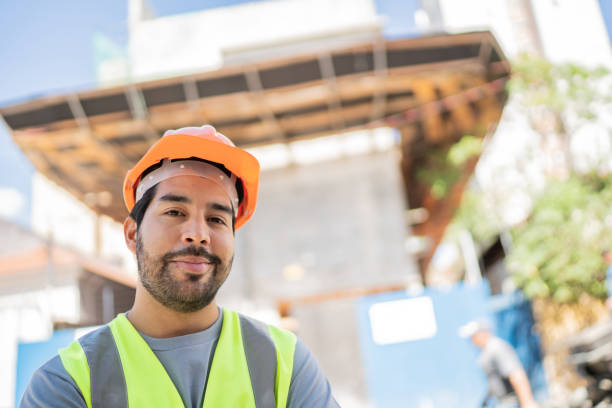 istock Portrait of a construction worker at a construction site 1338247275