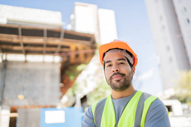 istock Portrait of a construction worker at a construction site 1338247333