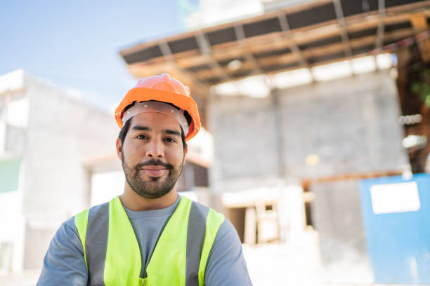 istock Portrait of a construction worker at a construction site 1338247345
