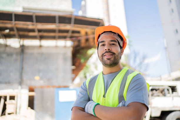 istock Portrait of a construction worker at a construction site 1338247349