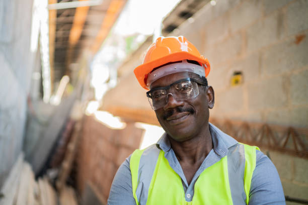 istock Portrait of a construction worker at a construction site 1338247469