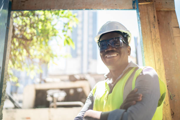 istock Portrait of a construction worker at a construction site 1338247510