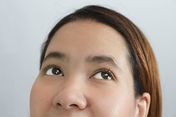 istock Young woman looking up there 133825219