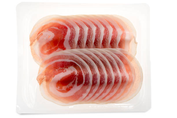 slices pancetta in plastic tray Italian rolled bacon, slices pancetta in plastic tray for sale in supermarket, top view flat lay uncooked bacon stock pictures, royalty-free photos & images