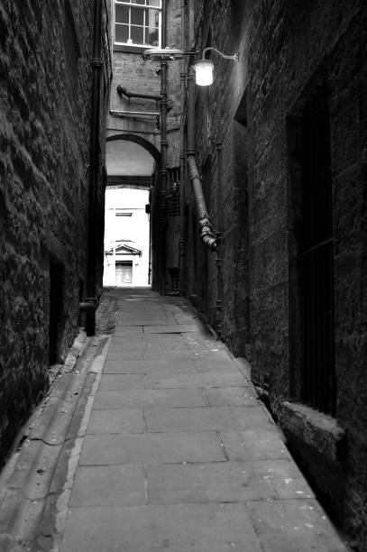 istock old medieval narrow close and lamp in Edinburgh 1338253141