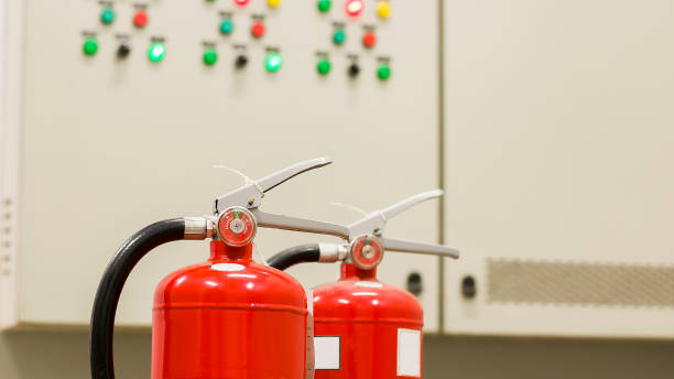 istock The red fire extinguisher is ready for use in case of an indoor fire emergency. 1338254912