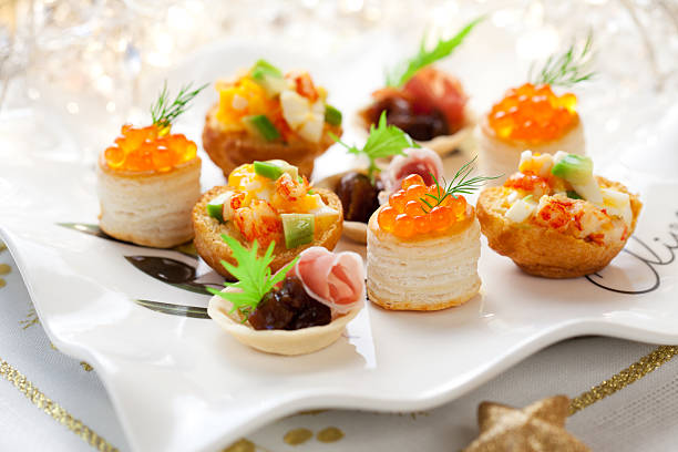 assortimento di spuntini per le festività - caviar salmon red gourmet foto e immagini stock
