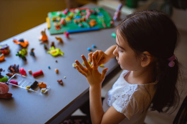 istock Plasticine is he favourite craft equipment for playing 1338265943
