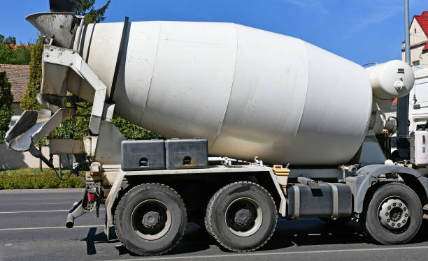 istock Cement mixer truck at the construction site 1338271422