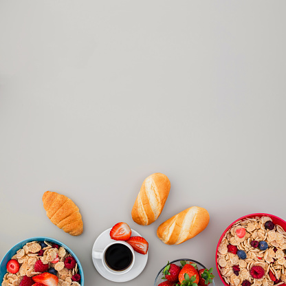 healthy breakfast on plain background with copy space