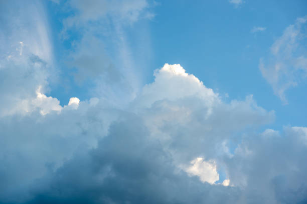 istock Blue sky and dark clouds background on daytime 1338274408