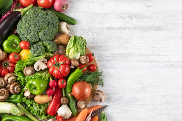 istock Fresh Vegetables on White Wooden Table 1338275647