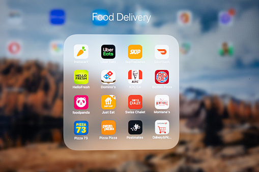 June 3 2021 - Calgary Alberta Canada - Food delivery app on an Apple Ipad TabletJune 3 2021 - Calgary Alberta Canada - Food delivery app on an Apple Ipad