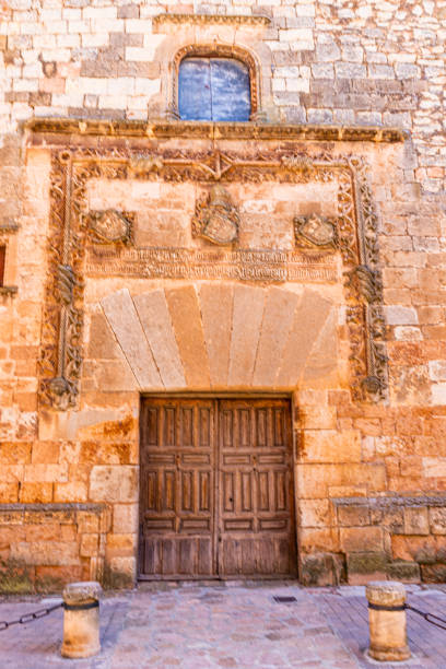 istock Door in the medieval stone wall, Ayllon, Spain. 1338277920