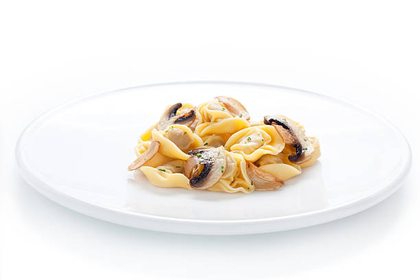 istock Tortellini dish with sauteed mushrooms and garlic 133828308
