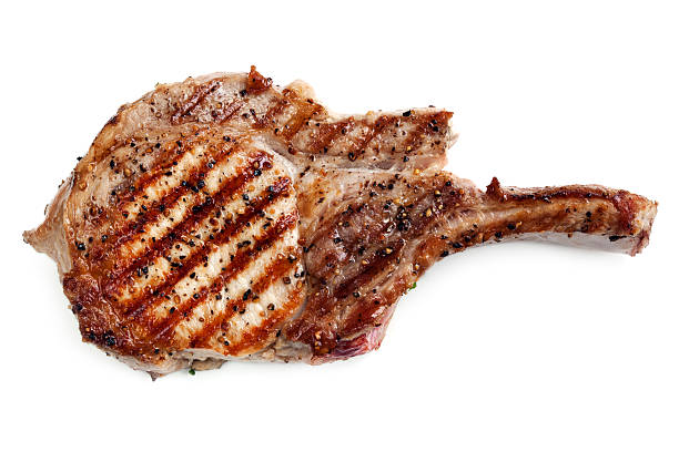 Grilled Pork Cutlet Grilled pork loin cutlet, isolated on white background. meat chop stock pictures, royalty-free photos & images