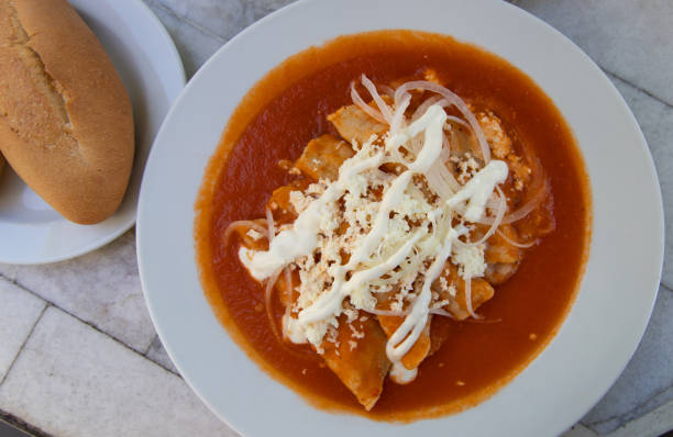 Red Enchiladas - traditional mexican food with tomato sauce and cheese in Mexico Traditional Mexican food in Oaxaca mexico state photos stock pictures, royalty-free photos & images