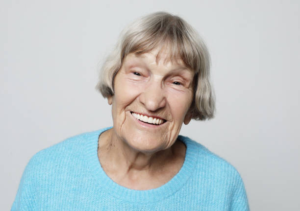 istock Grey haired old nice beautiful laughing woman 1338296603