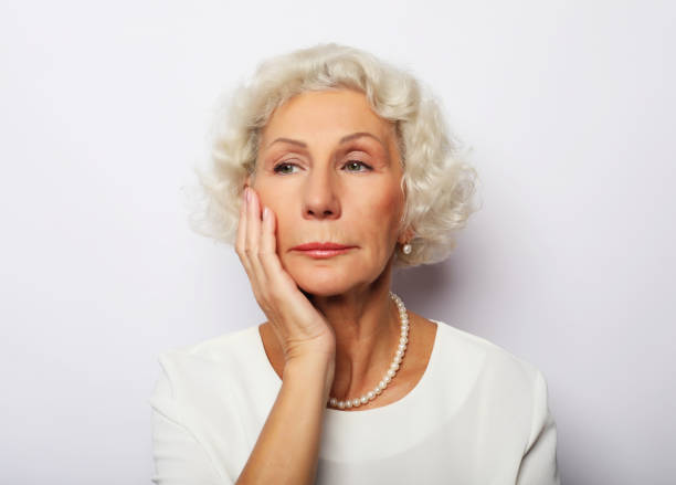 istock Thoughtful serious senior woman feeling blue worried about problems 1338296737