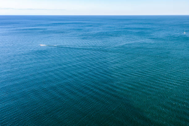 Krasnodar region, Russia - May 13, 2012: Fishermen on a boat in the sea seen from the air