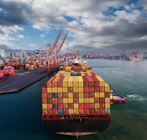 istock Aerial view of container freight ship carrying container box for import and export business logistic. 1338300054