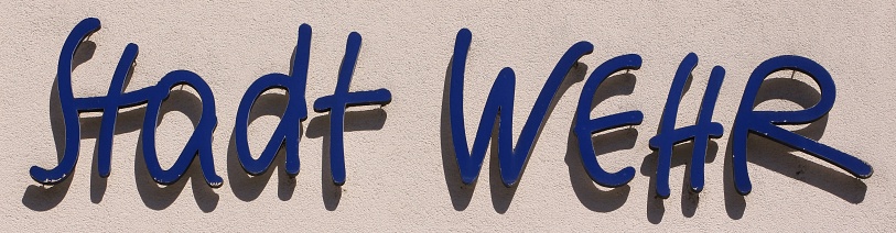 June 22, 2021, Wehr in the Black Forest: Lettering of the town of Wehr in the Black Forest in blue lettering