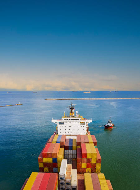 istock Aerial view of container freight ship carrying container box for import and export business logistic. 1338307106