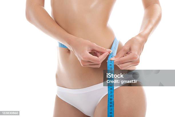 Woman Measure Stock Photo - Download Image Now - Abdomen, Adult, Adults Only